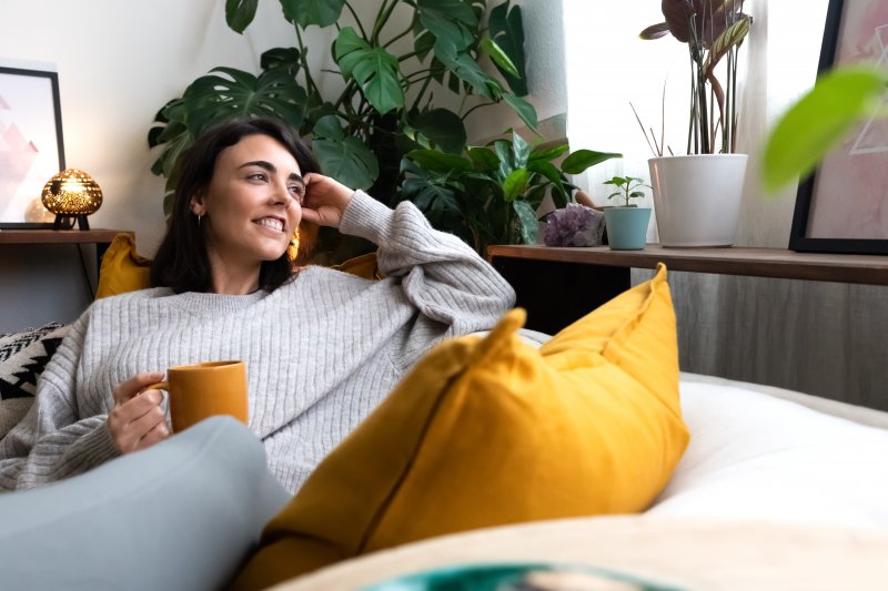 woman relaxing on couch 